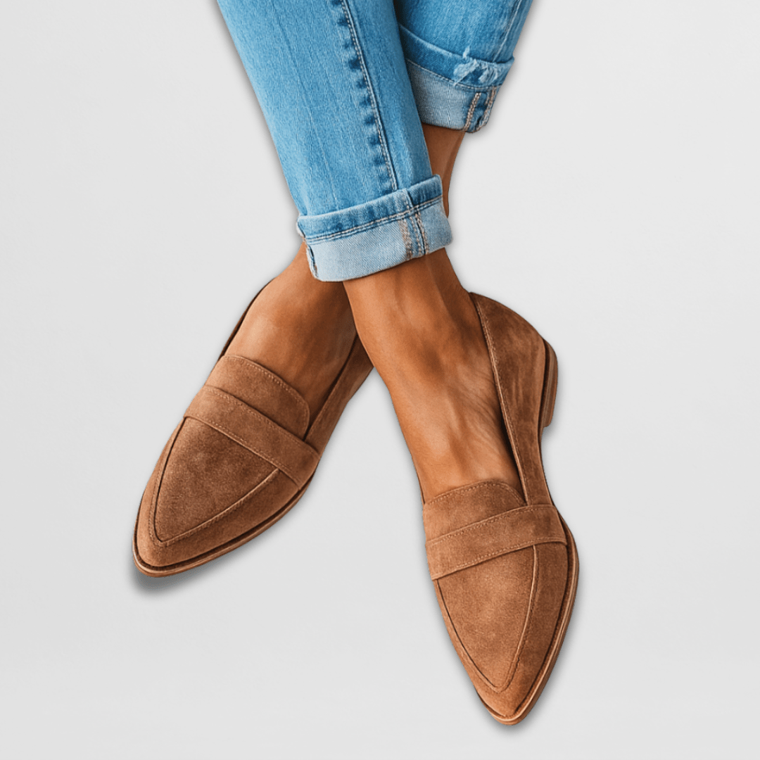 Tan suede pointed loafer flats with band detail worn with rolled jeans