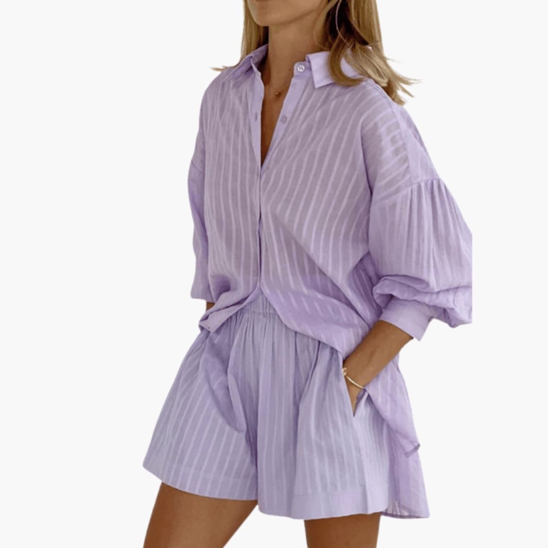 Lavender button-down collared mini dress with vertical pleats and puffed sleeves