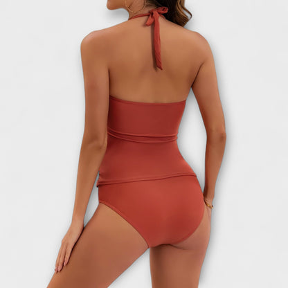 Back view of red halter bikini with tie closure and gold accents
