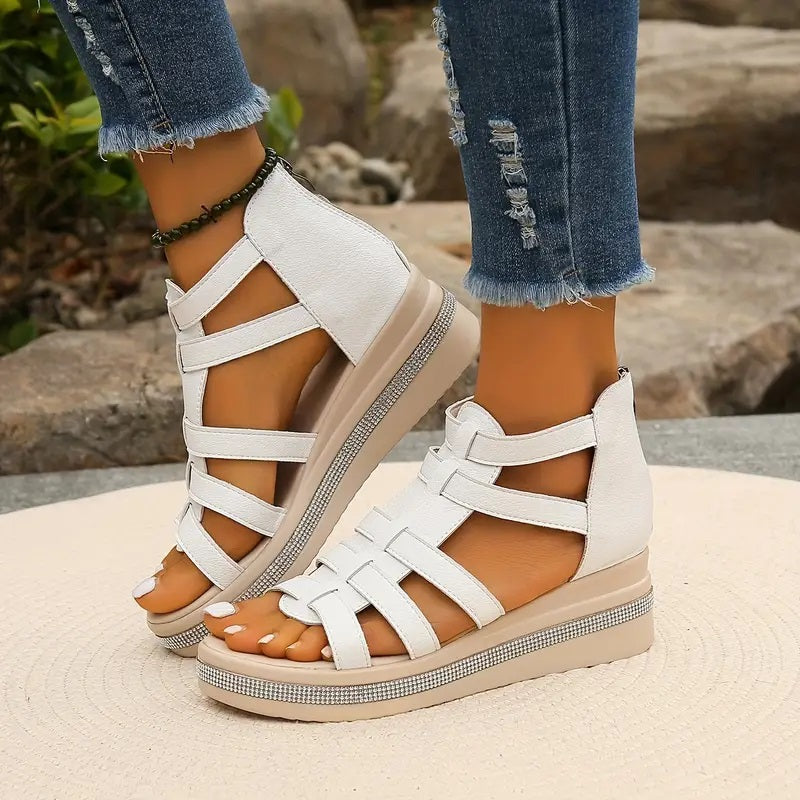 Beige strappy platform sandals with rhinestone sole and white leather straps