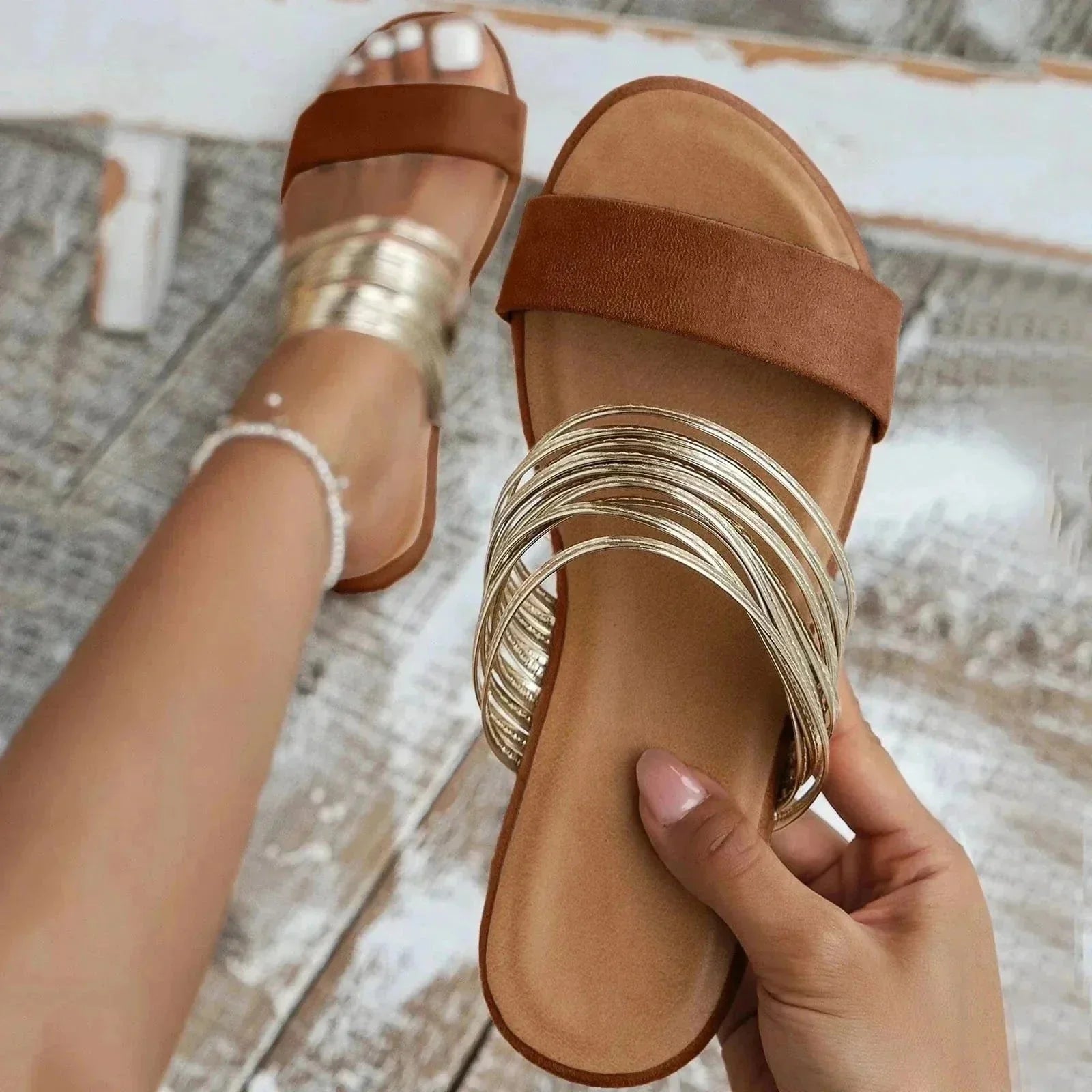 Cognac brown padded slide sandal with metallic gold straps
