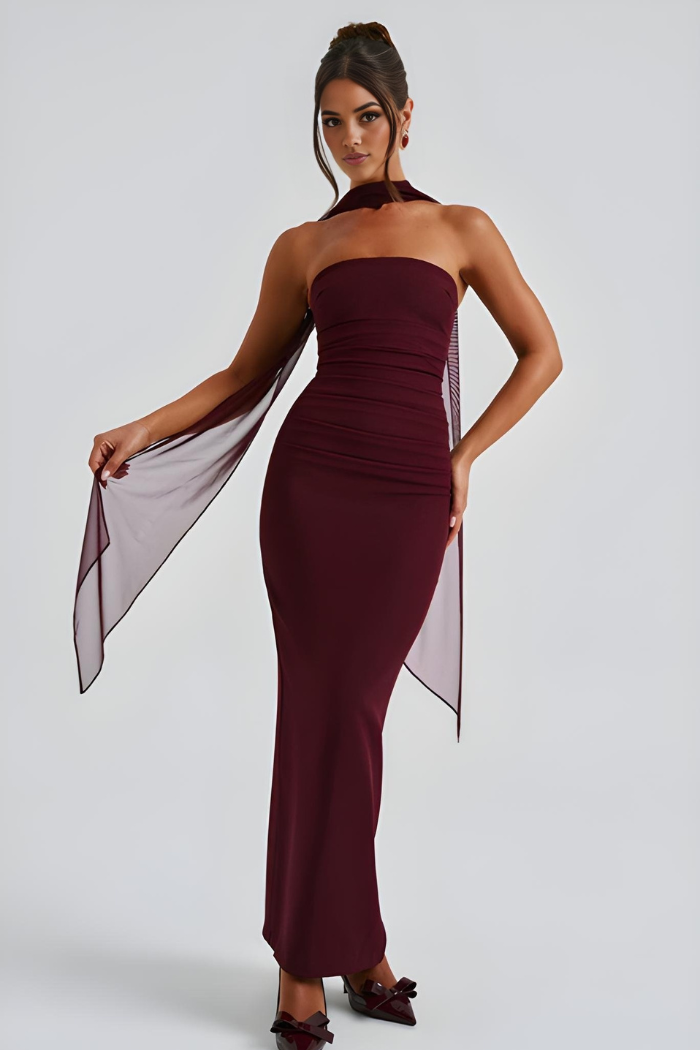 Burgundy strapless maxi bodycon dress with ruching and sheer scarf detail
