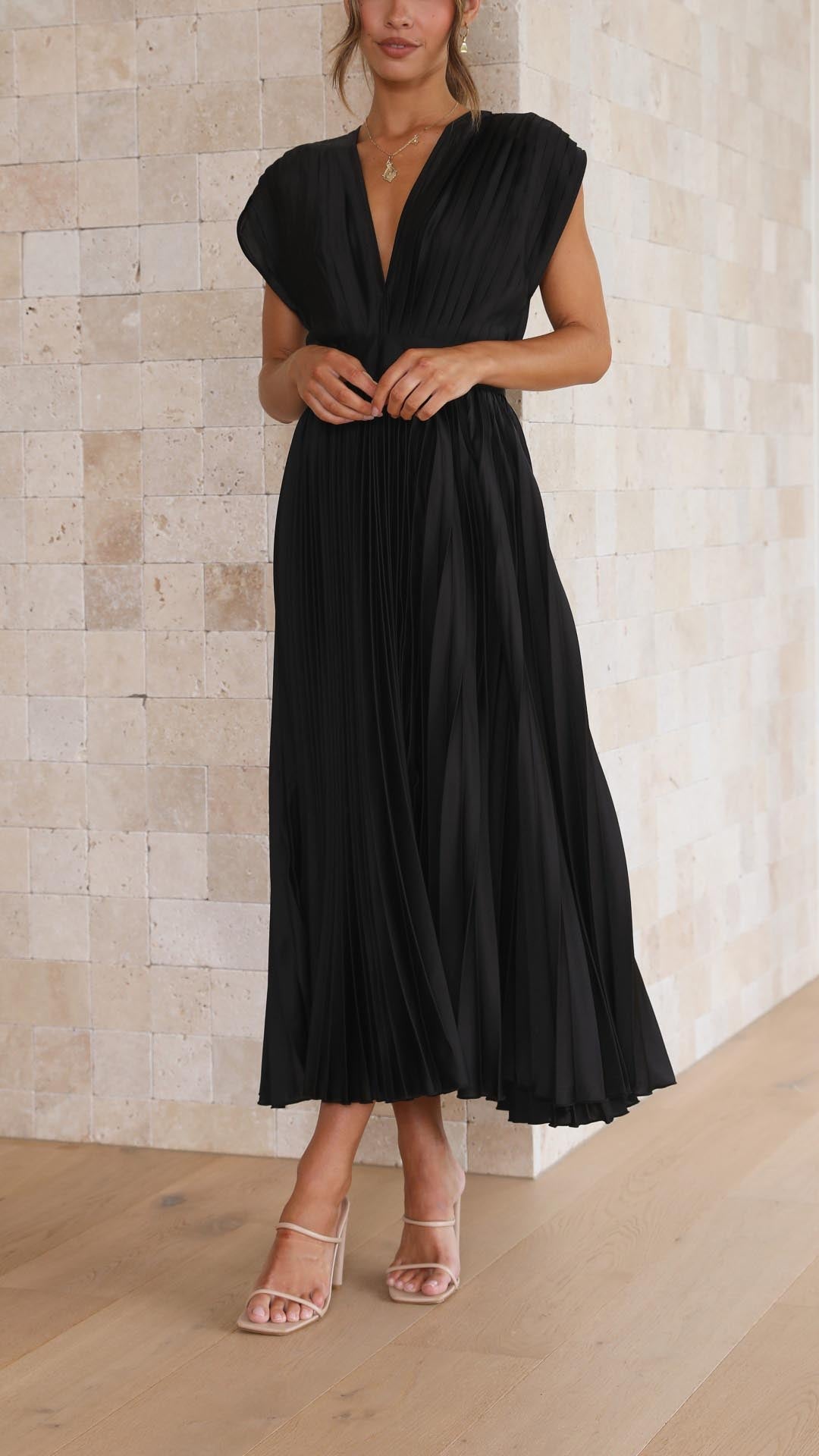 Black pleated sleeveless v-neck midi dress with high waisted silhouette