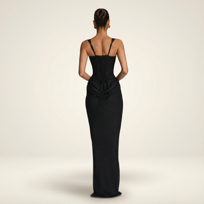 Back view of black maxi dress with lace-up corset back and thin straps