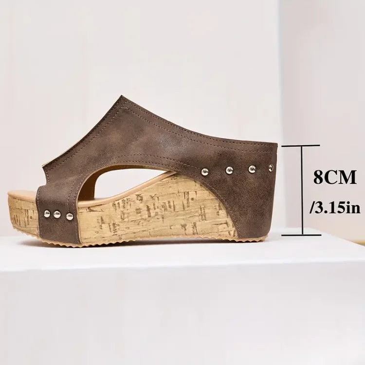Brown suede studded cork wedge sandal profile showing 8cm platform height