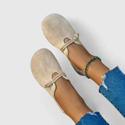 Beige suede orthopedic loafer with rope accent, overhead flat lay view