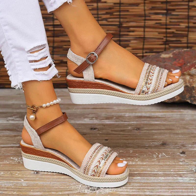 Boho woven platform wedge sandals with tan leather ankle strap and cream geometric embroidery