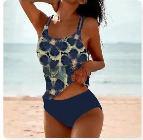 Women's ornamental tank swimsuit with navy blue and cream floral medallion pattern, navy bottoms
