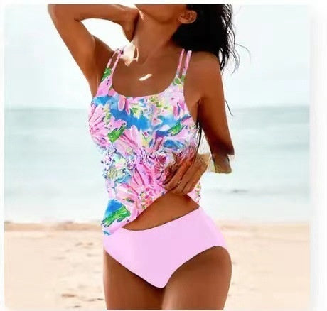 Women's ornamental print tank swimsuit with pink and blue tropical floral design, lavender bottoms