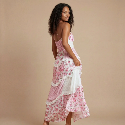 Pink floral wedding guest maxi dress with smocked waist, side back view