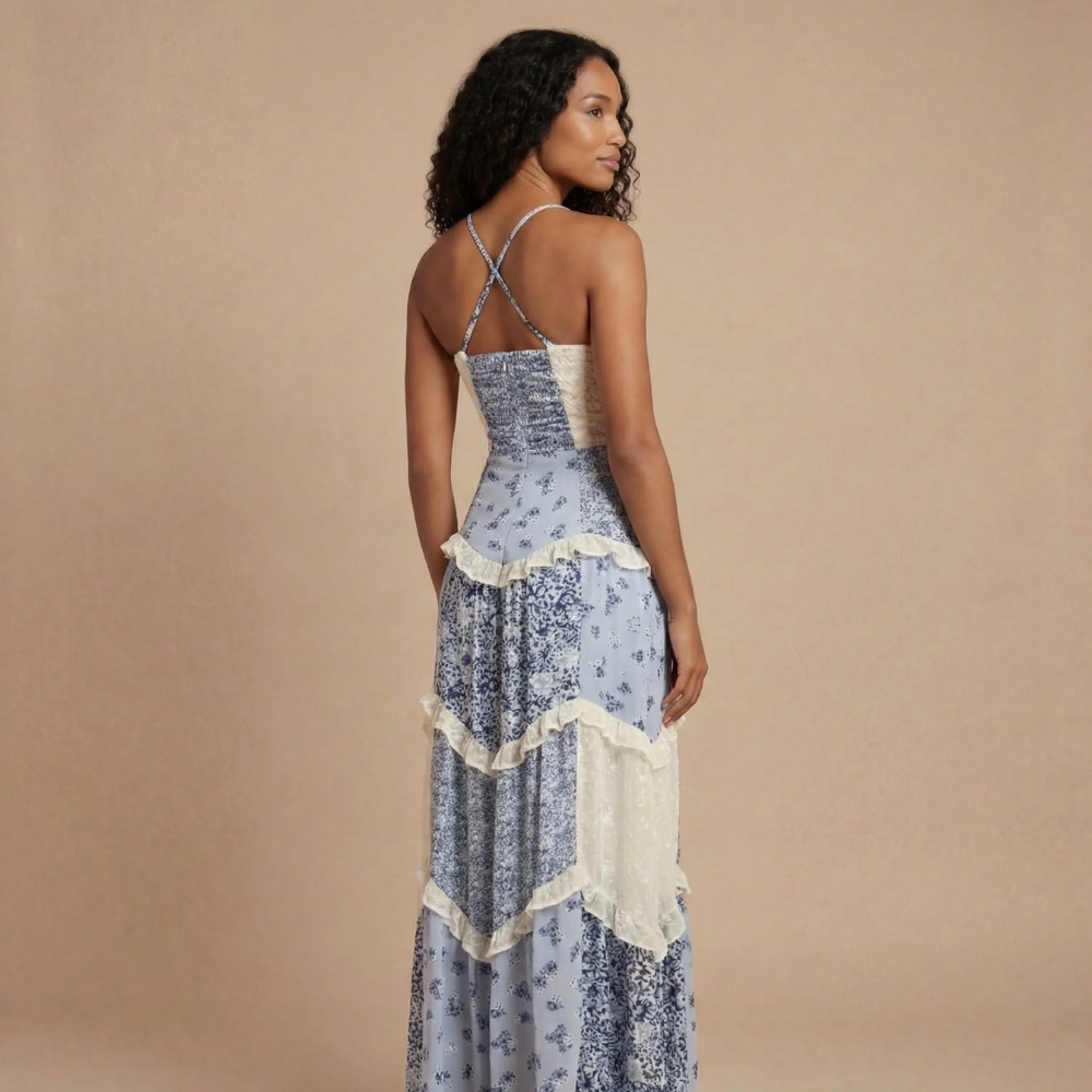 Blue floral maxi dress with cross-back straps and layered ruffles, back view