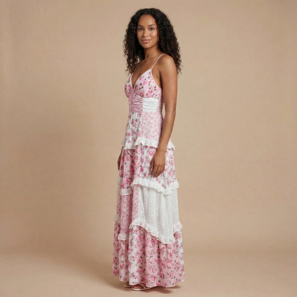 Women's pink floral maxi dress with V-neckline and tiered ruffles, front view