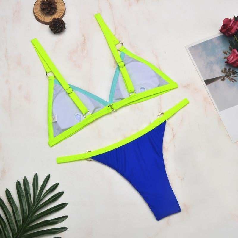 Neon yellow triangle bikini with turquoise lining and metal ring details