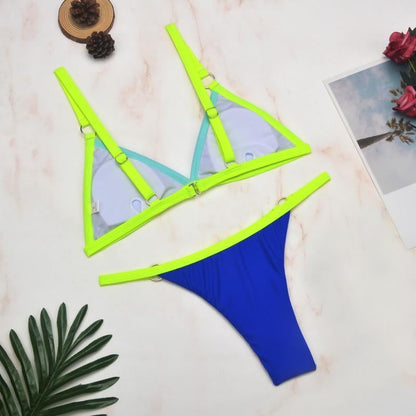 Neon yellow triangle bikini with turquoise lining and metal ring details