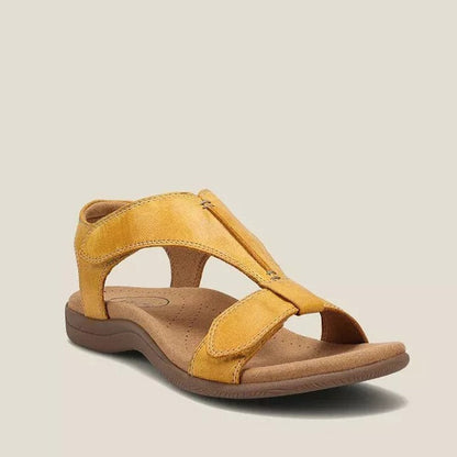 Golden yellow t-strap orthopedic sandal with contoured footbed and velcro strap