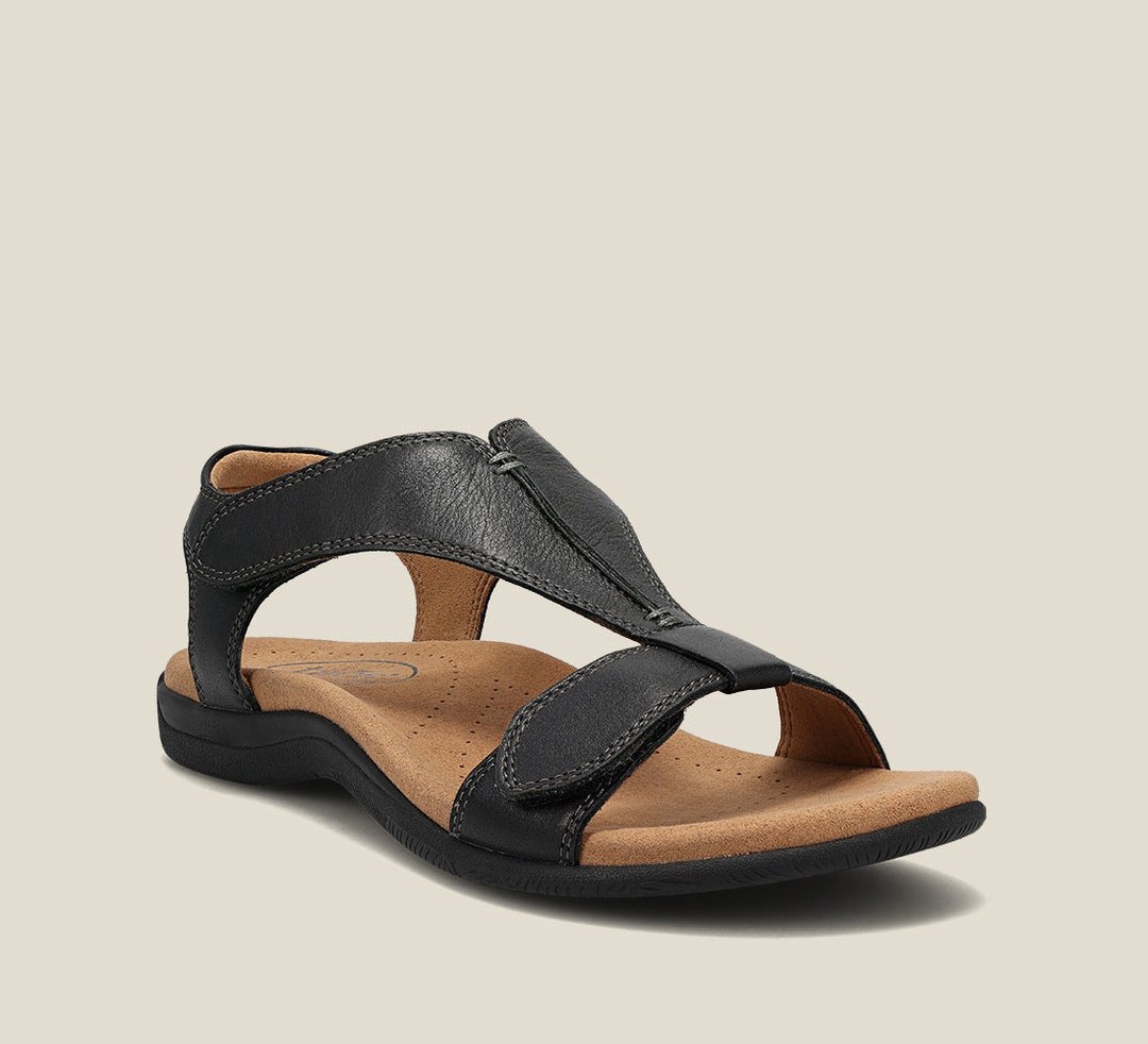 Black leather t-strap orthopedic sandal with cushioned footbed and grip sole