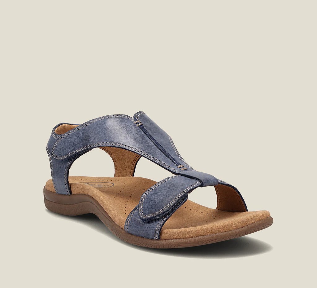 Navy blue t-strap orthopedic sandal with contoured arch support and soft lining