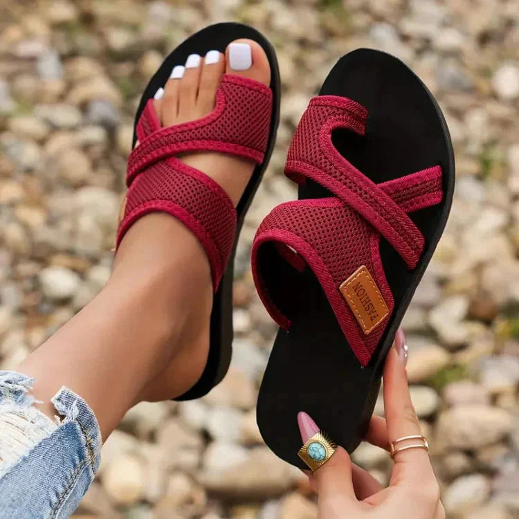 Burgundy cushioned sandals with adjustable textured straps and black sole