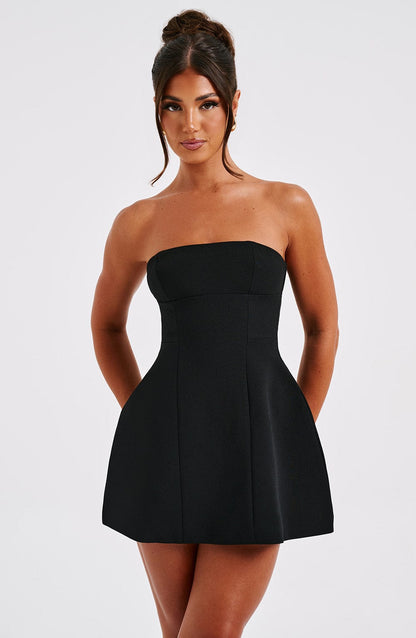 Black strapless bubble mini dress close-up of seamed bodice detail